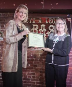Janine presents Carol Werner with the WWII/Traditional Award on behalf of Bill Holmberg