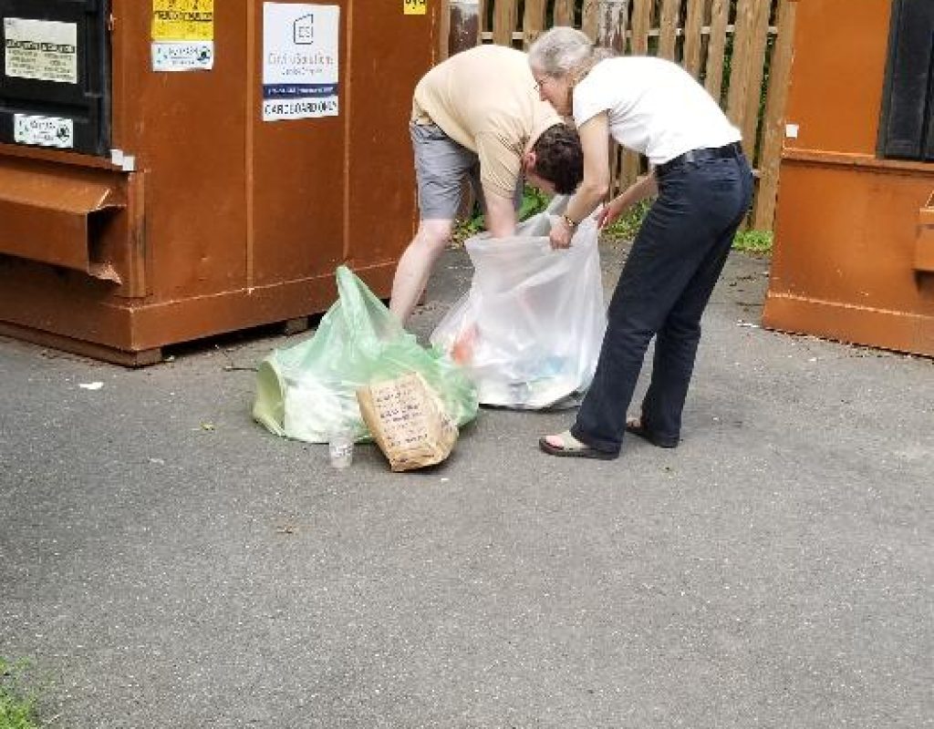 Barbara and Taylor Sorting Through Retreat Waste